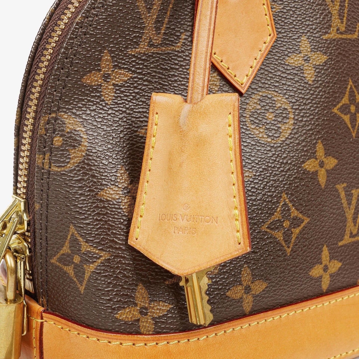 Louis Vuitton Alma BB Monogram Canvas Handbag