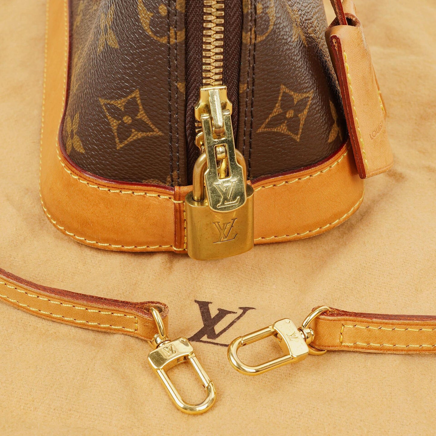 Louis Vuitton Alma BB Monogram Canvas Handbag