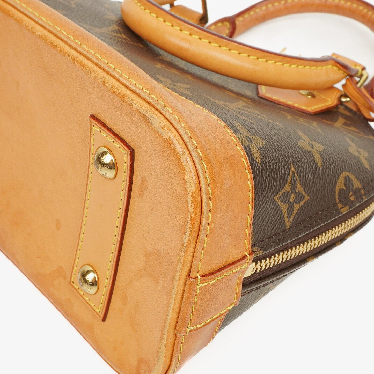 Louis Vuitton Alma BB Monogram Canvas Handbag