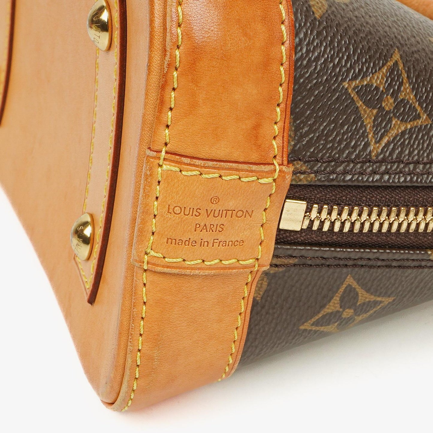 Louis Vuitton Alma BB Monogram Canvas Handbag