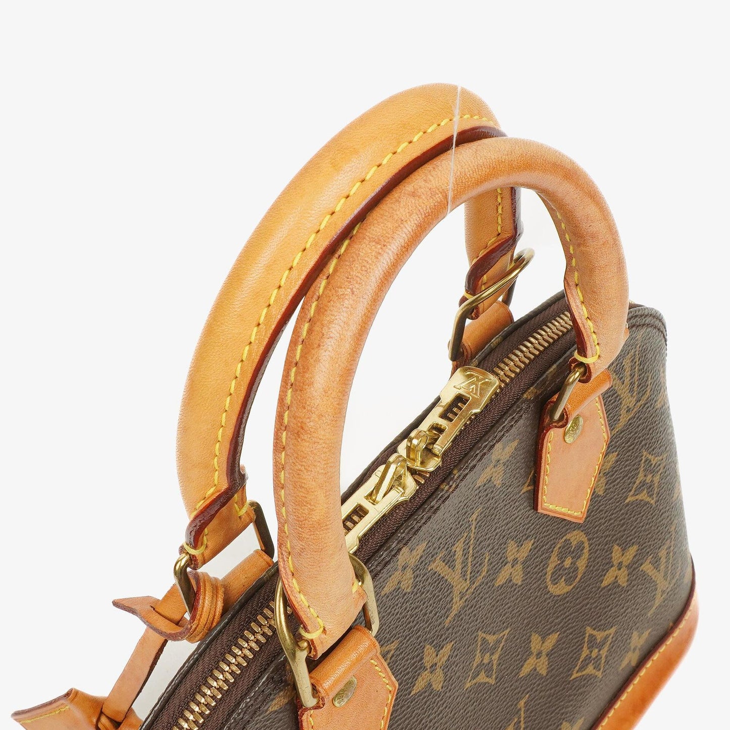 Louis Vuitton Alma BB Monogram Canvas Handbag
