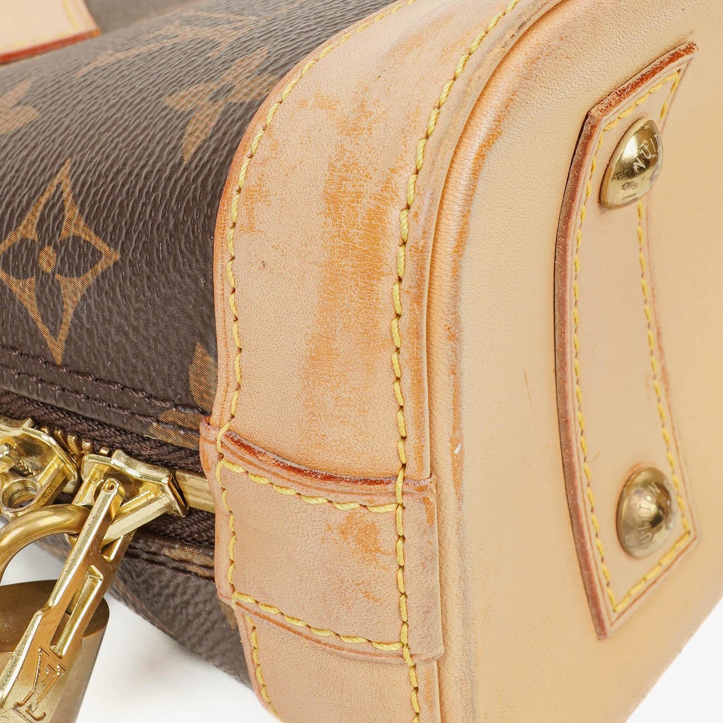 Louis Vuitton Alma BB Monogram Canvas Handbag