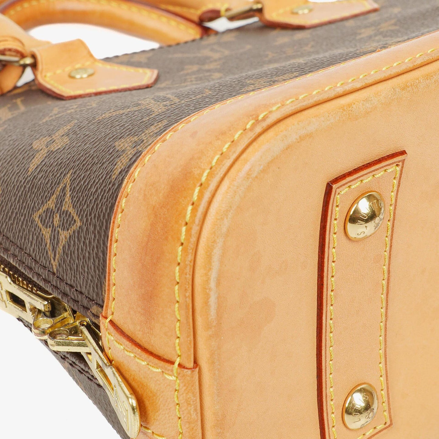 Louis Vuitton Alma BB Monogram Canvas Handbag