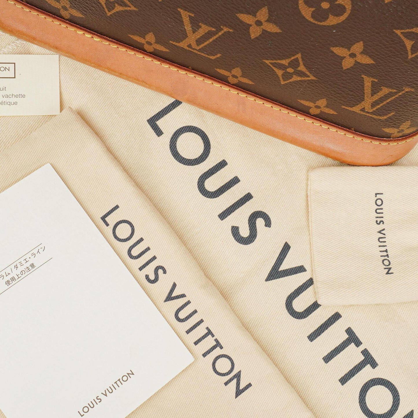 Louis Vuitton Alma BB Monogram Canvas Handbag