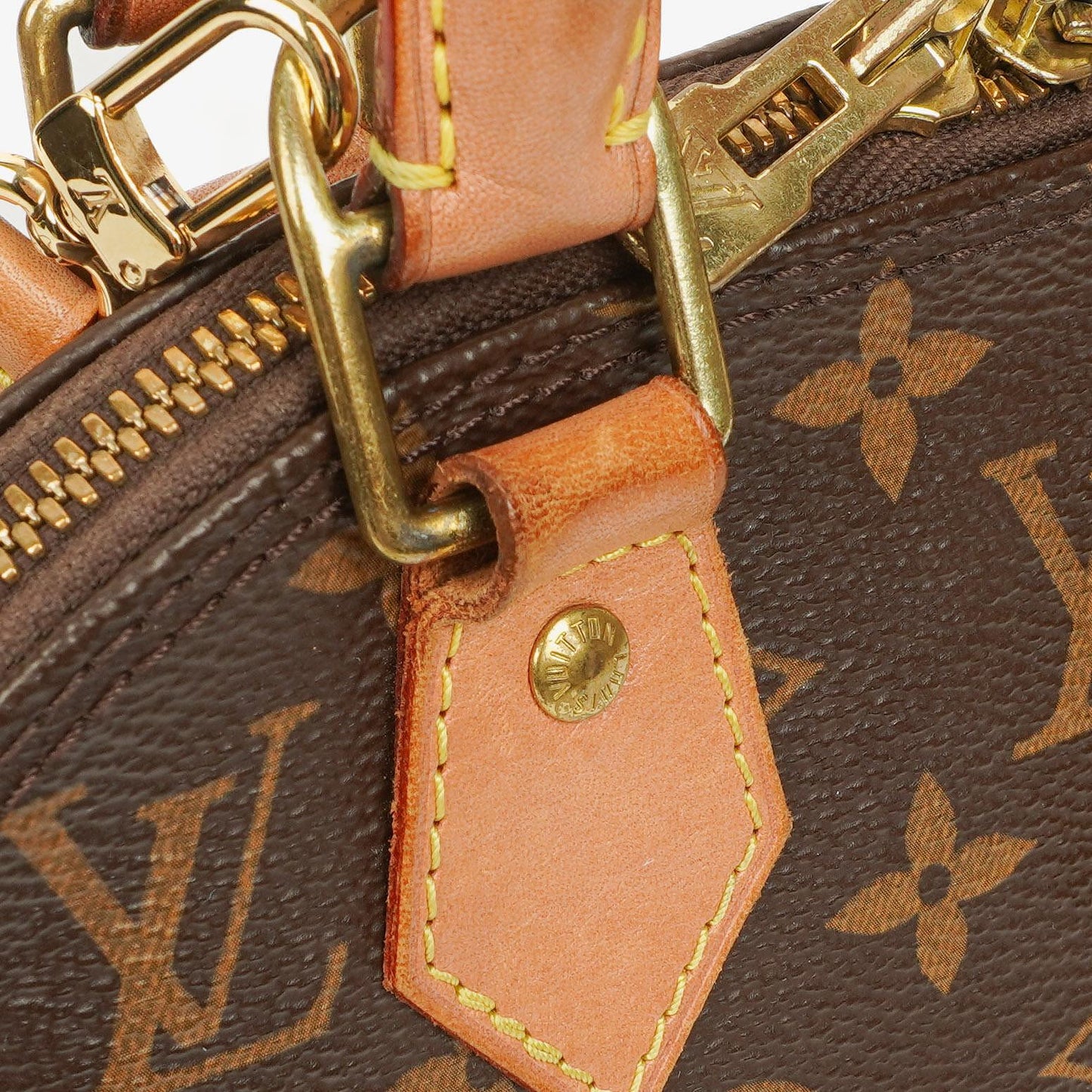 Louis Vuitton Alma BB Monogram Canvas Handbag