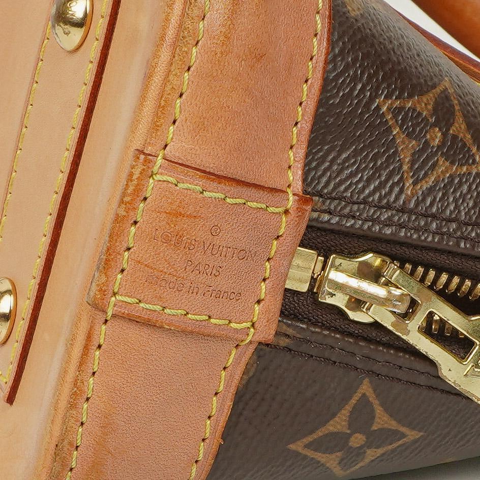 Louis Vuitton Alma BB Monogram Canvas Handbag