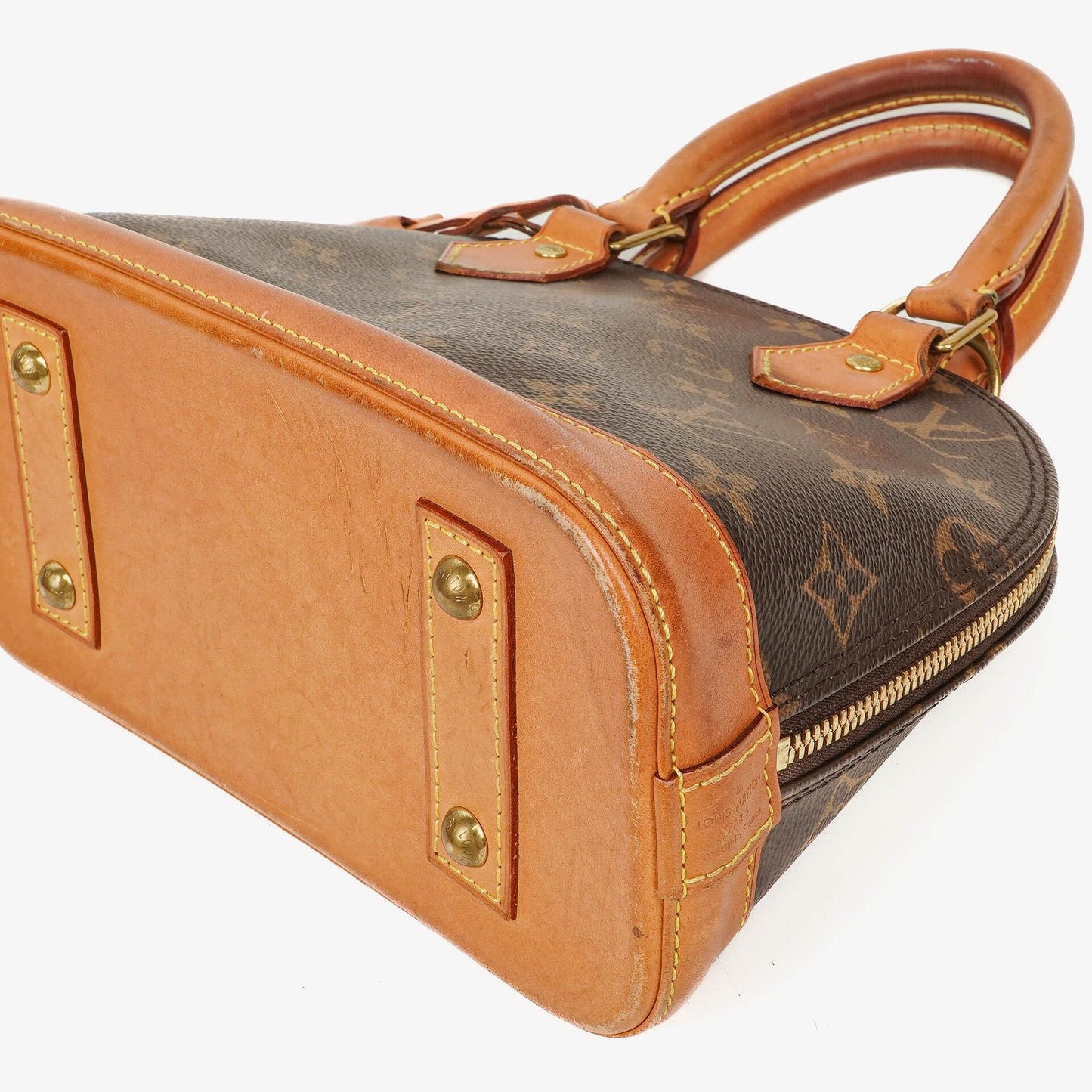 Louis Vuitton Alma BB Monogram Canvas Handbag