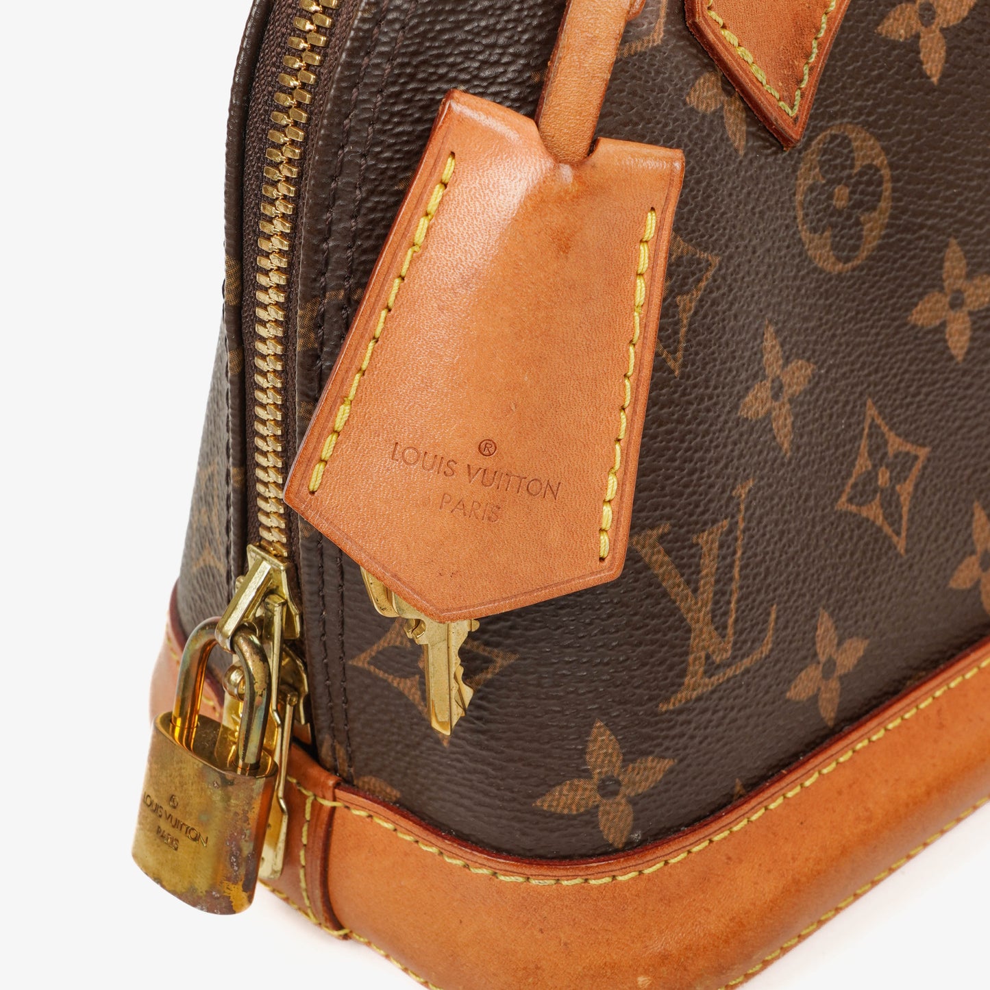 Louis Vuitton Alma BB Monogram Canvas Handbag