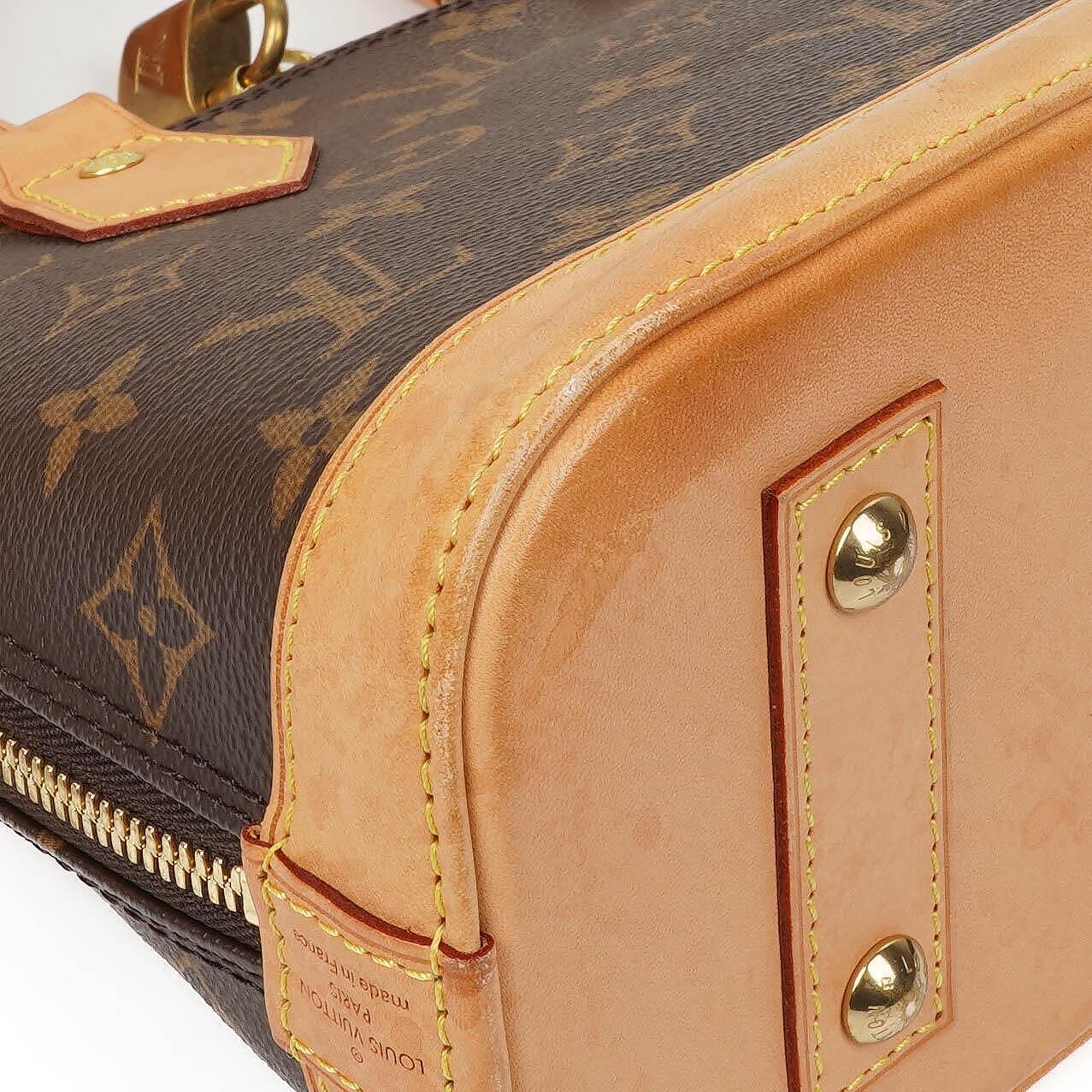 Louis Vuitton Alma BB Monogram Canvas Handbag