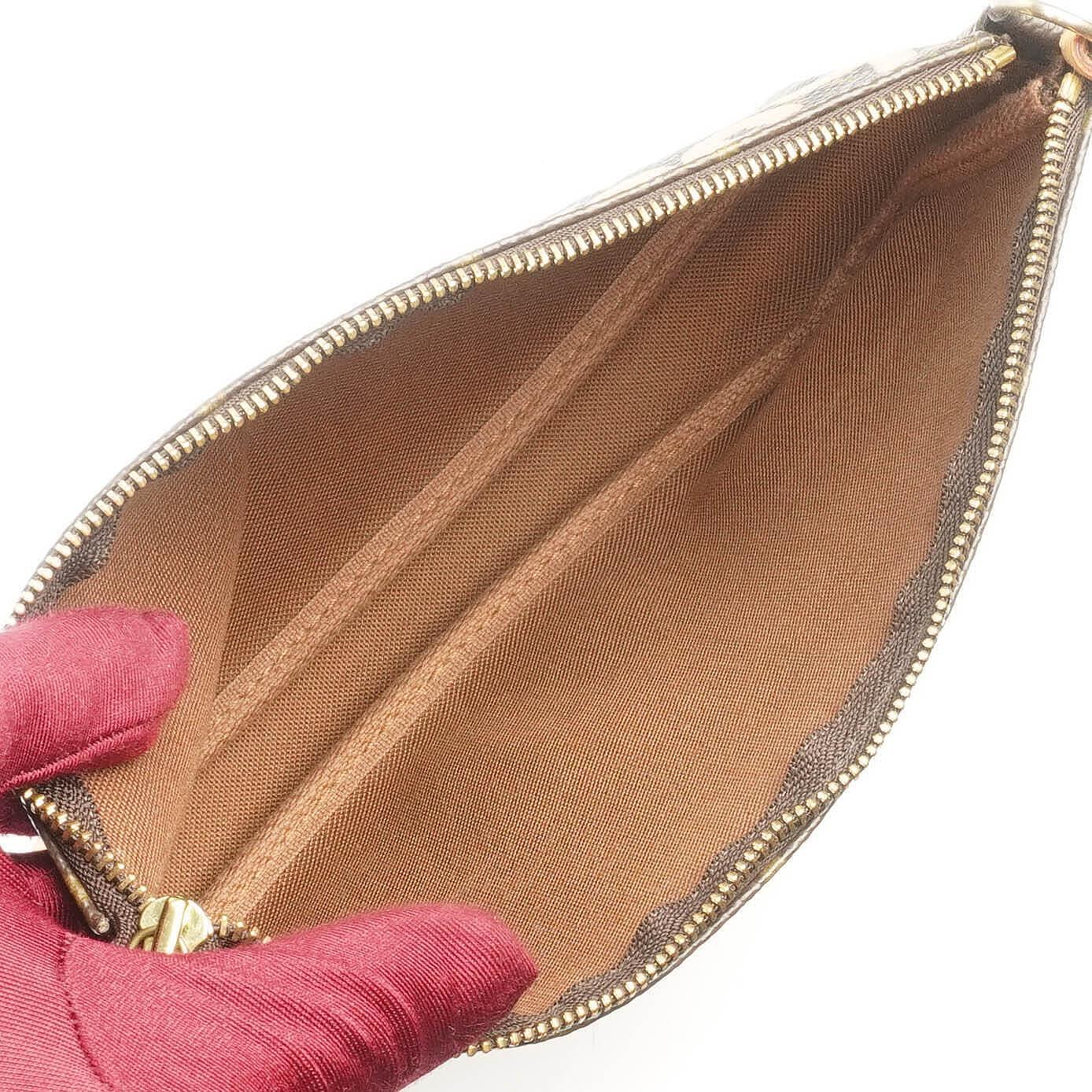Louis Vuitton Pochette Accessoire in Monogram Graffiti Canvas Clutch Handbag a part of Stephen Sprouse collection