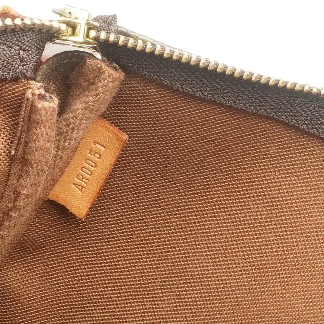 Louis Vuitton Pochette Accessoire in Monogram Graffiti Canvas Clutch Handbag a part of Stephen Sprouse collection