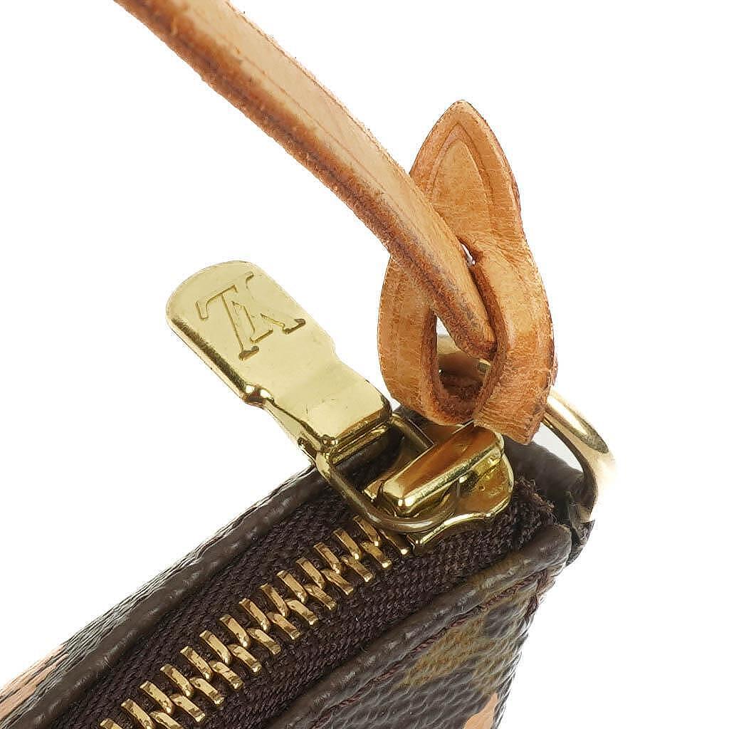 Louis Vuitton Pochette Accessoire in Monogram Graffiti Canvas Clutch Handbag a part of Stephen Sprouse collection