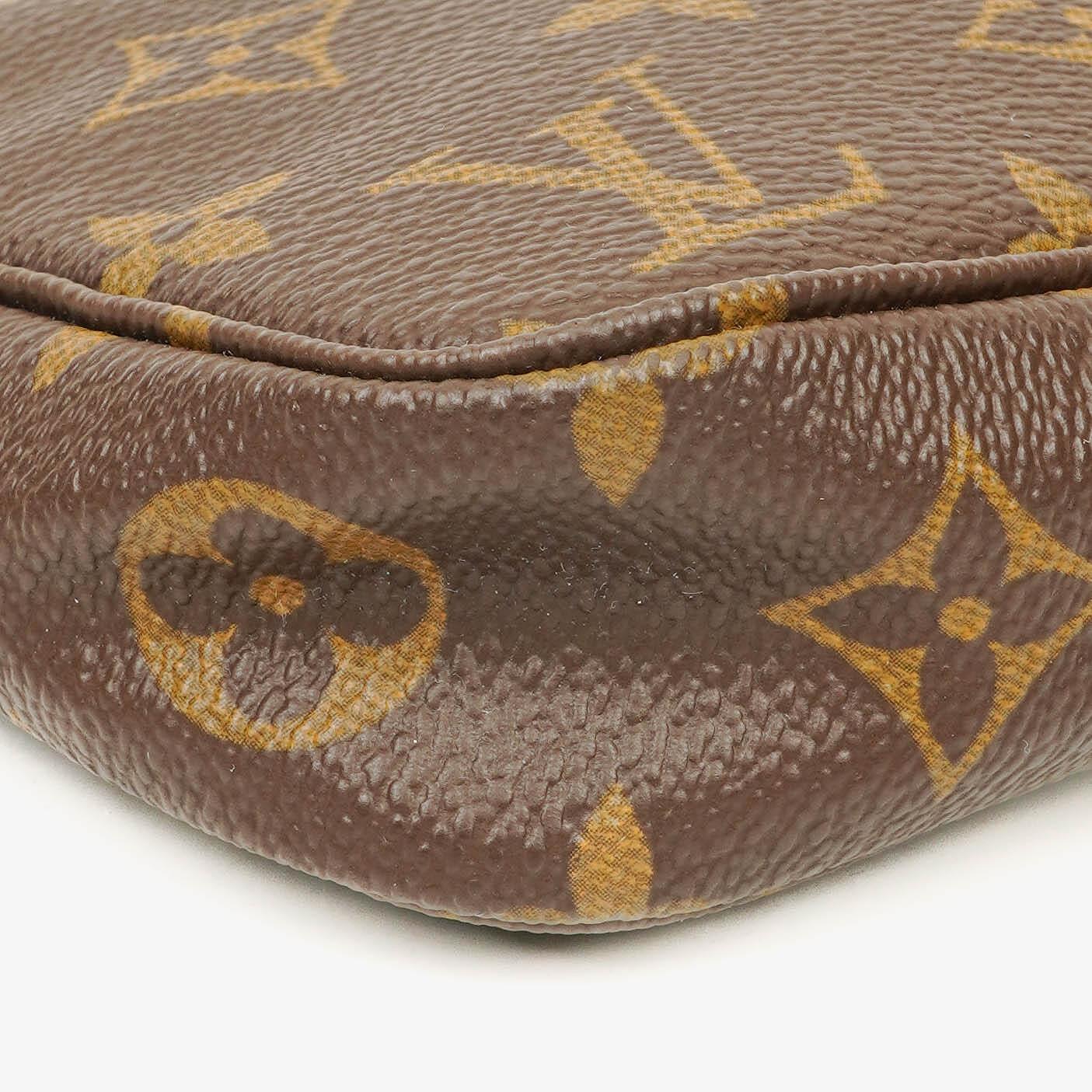 Louis Vuitton Pochette Accessoires Monogram Canvas Clutch Bag
