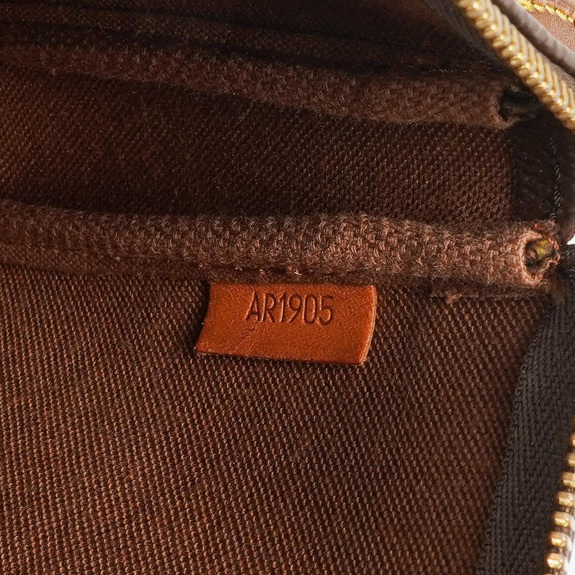 Louis Vuitton Pochette Accessoires Monogram Canvas Clutch Bag