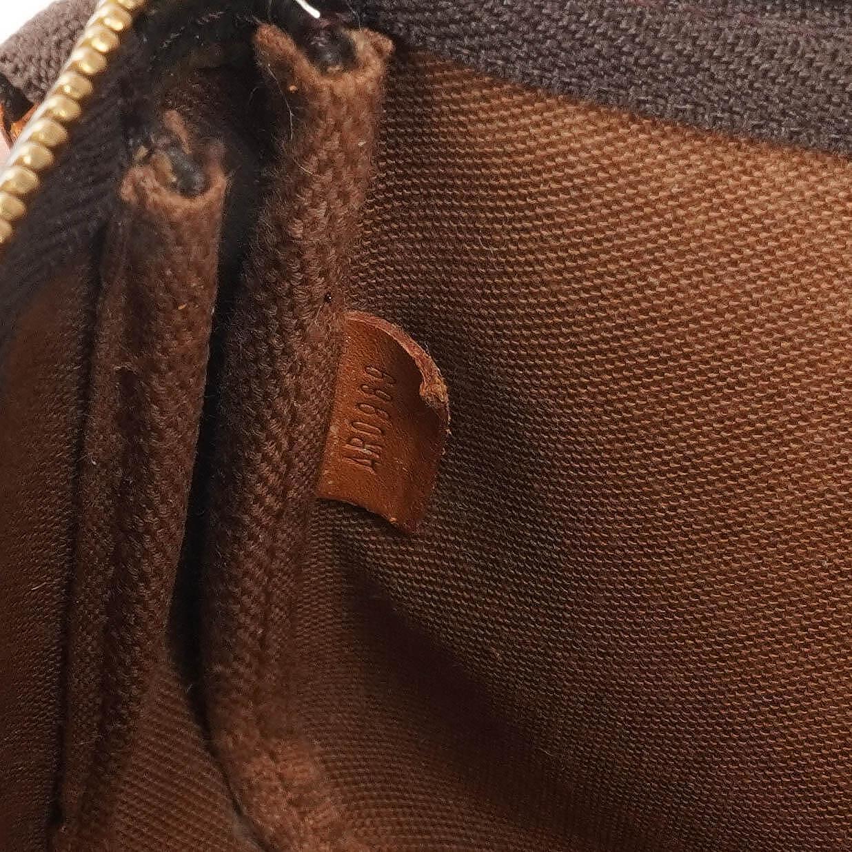 Louis Vuitton Pochette Accessoires Monogram Canvas Clutch Handbag