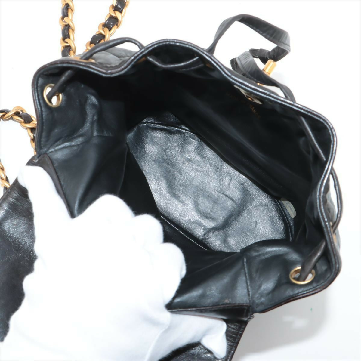 Chanel  Black Lambskin Diamond-Quilted Flap Backpack