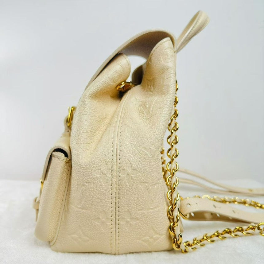 TT!  Louis Vuitton BJ11021L05017 Montsouris Cream Empreinte Leather Cowskin Backpack